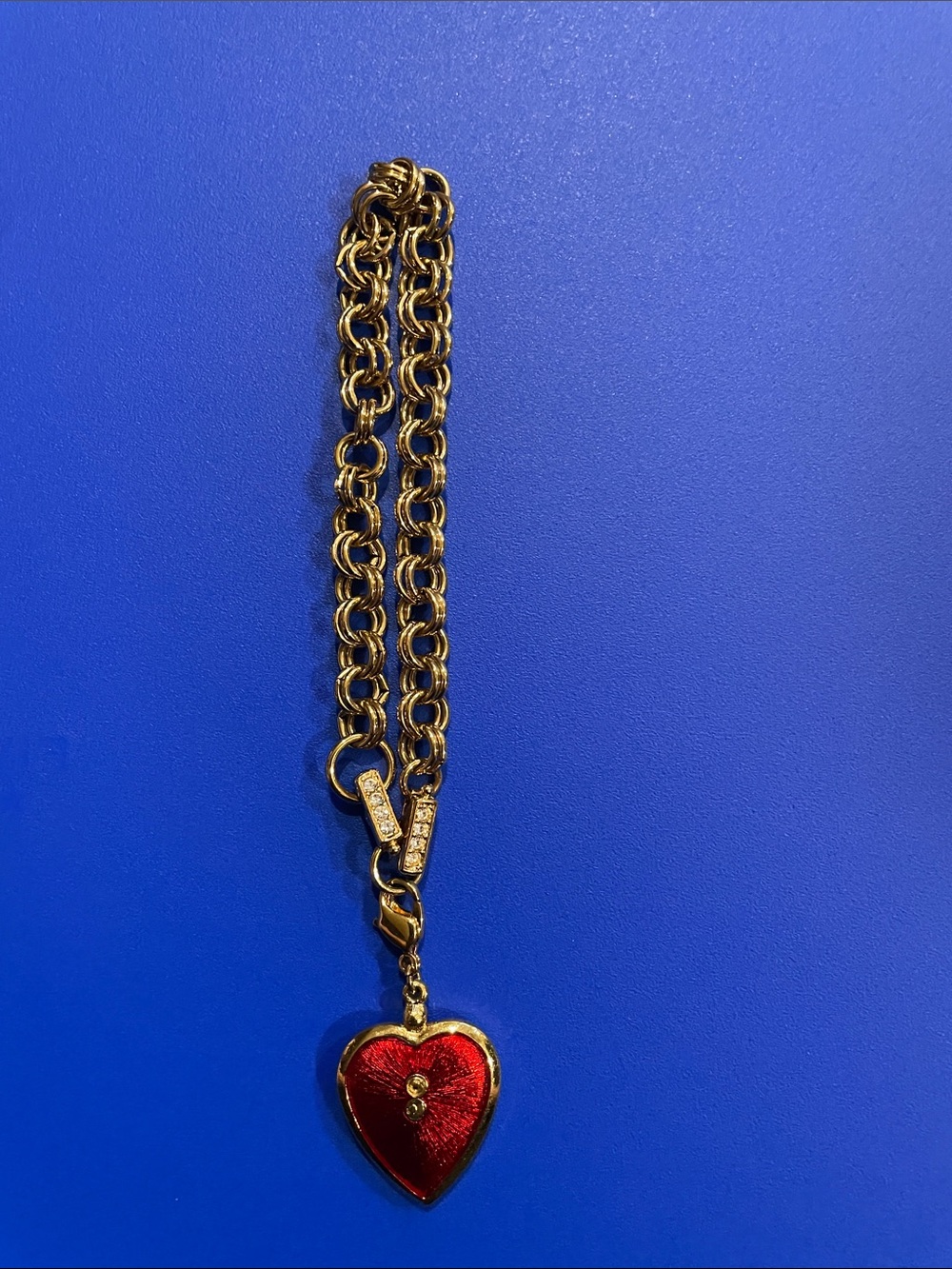 Gold Chain Necklace with Red Heart pendant and Crystal Accents on back side.